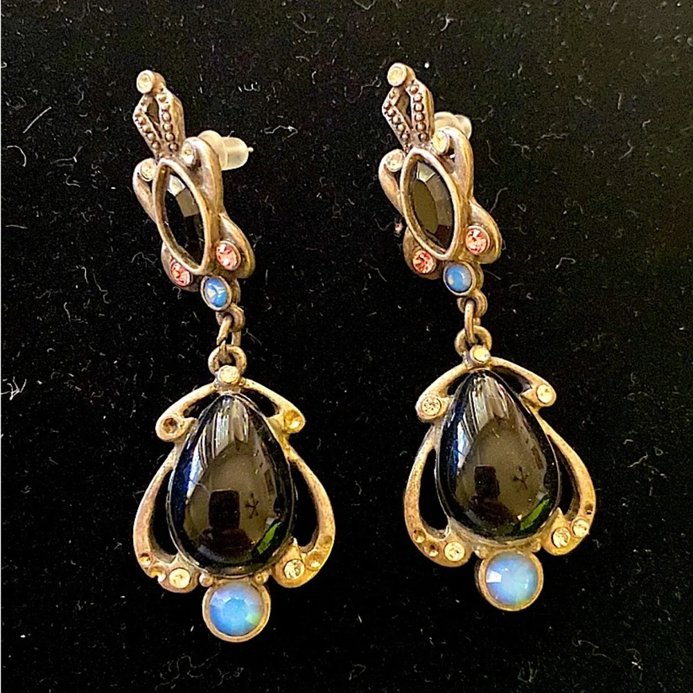 Quality stone and multi colored crystal large size dangle earrings.